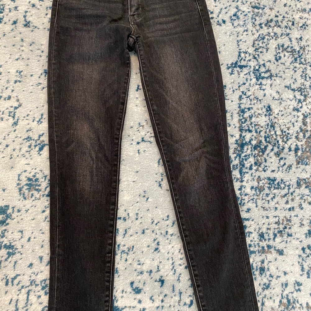 Levi’s mid rise 711 skinny jean black washed